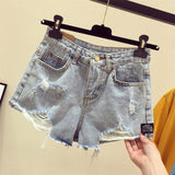 High waist hole denim shorts